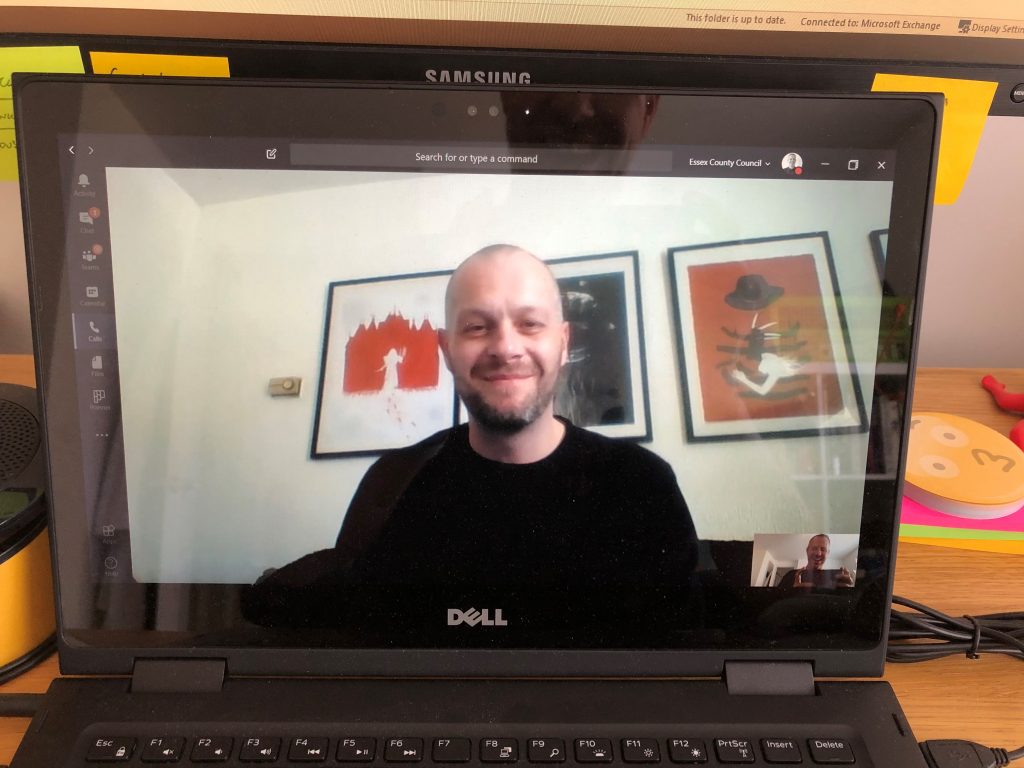 image of author on a video call on a laptop